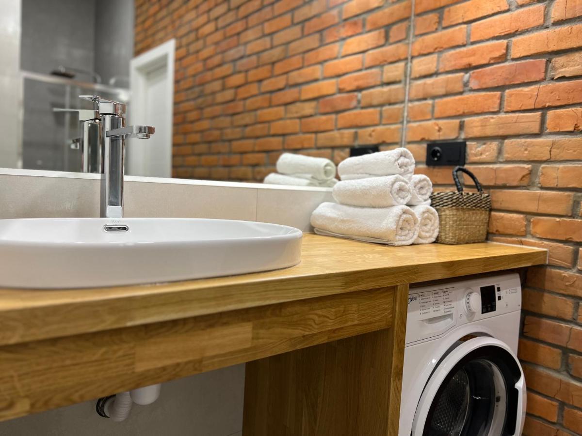 Appartement «Гори́Ще На Площі Польський Ринок» à Kamianets-Podilsky Extérieur photo