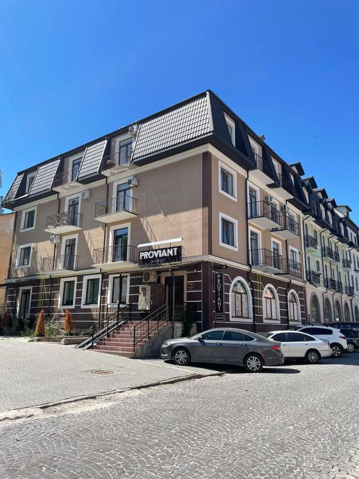 Appartement «Гори́Ще На Площі Польський Ринок» à Kamianets-Podilsky Extérieur photo