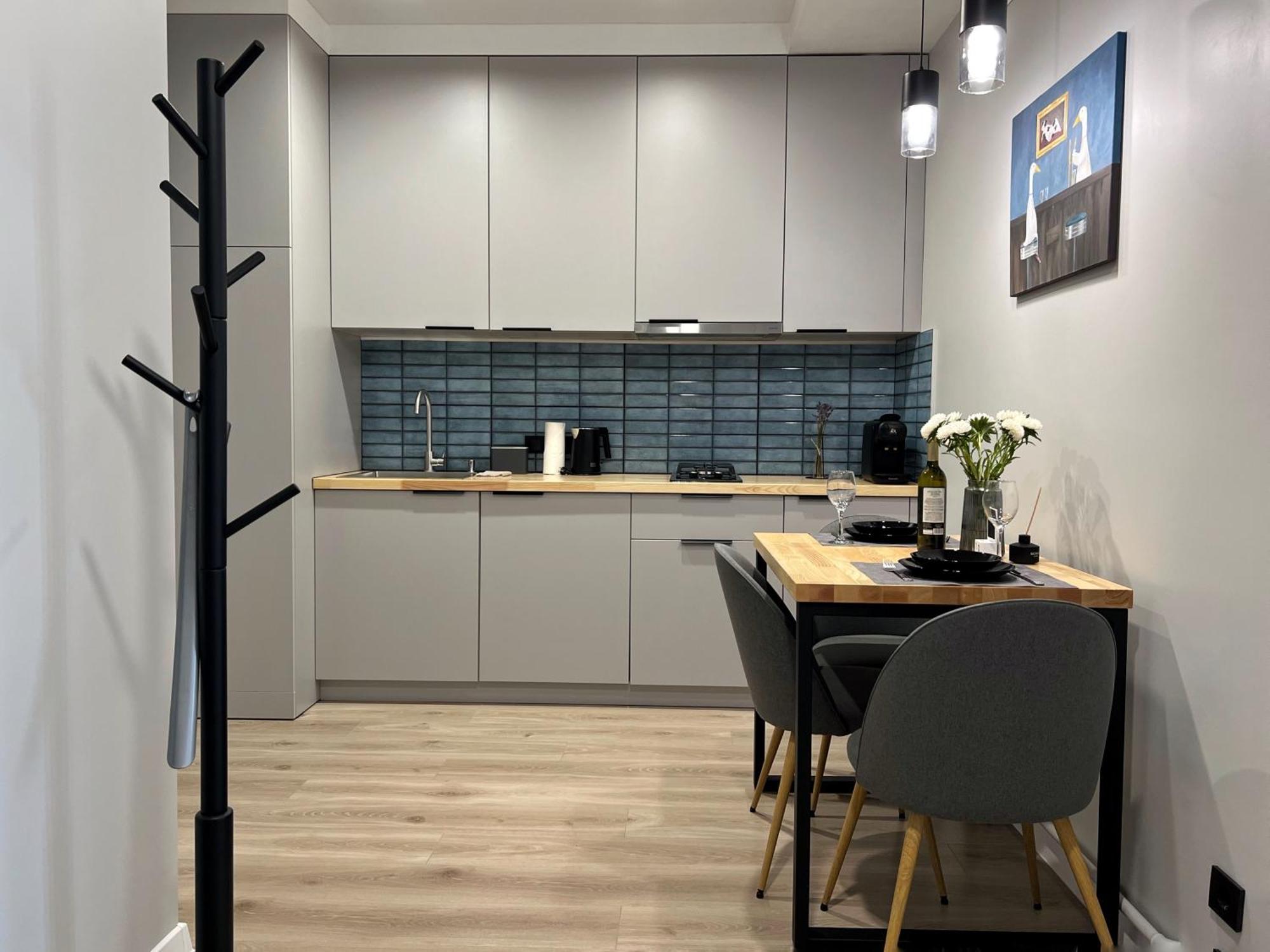 Appartement «Гори́Ще На Площі Польський Ринок» à Kamianets-Podilsky Extérieur photo