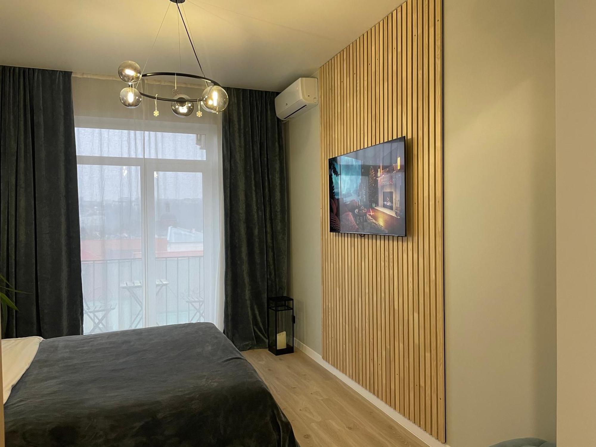 Appartement «Гори́Ще На Площі Польський Ринок» à Kamianets-Podilsky Extérieur photo